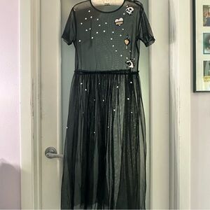 Descendants sheer black dress w studs on the skirt & fun patches on the top